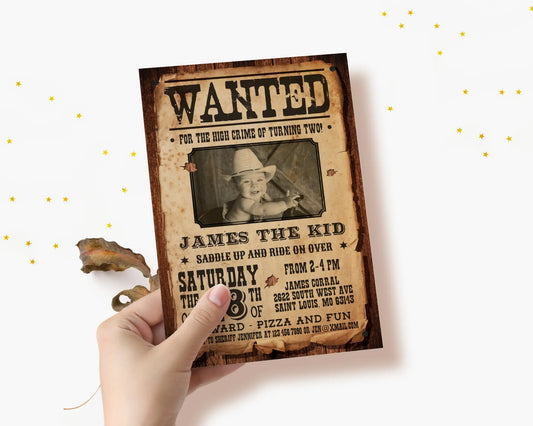 Editable Wanted Poster invitation with cowboy theme, personalized with child’s photo and birthday details, shown being held in hand.