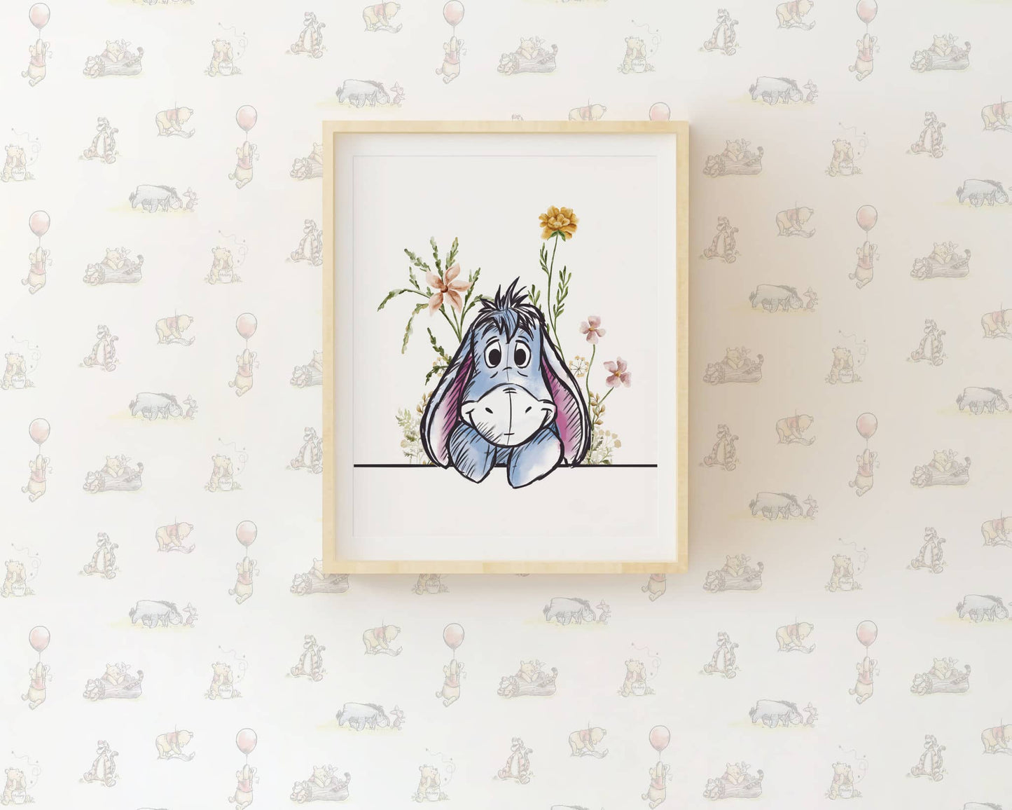 Eeyore watercolor wall art print with delicate floral background, framed nursery decoration featuring Winnie the Pooh character on pastel patterned wallpaper.
