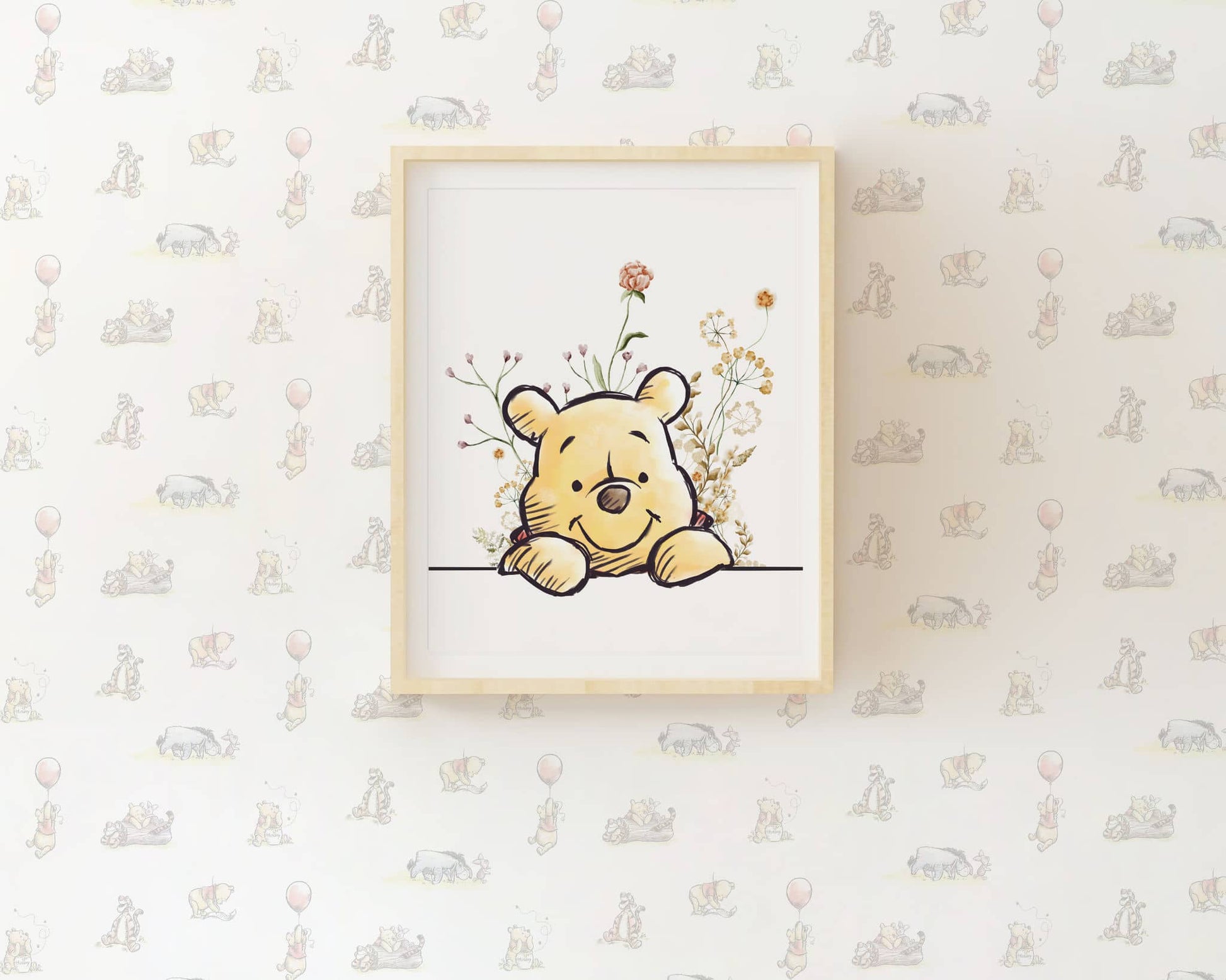 Winnie the Pooh watercolor wall art print with soft floral accents, framed nursery decor featuring Pooh on pastel patterned wallpaper background.
