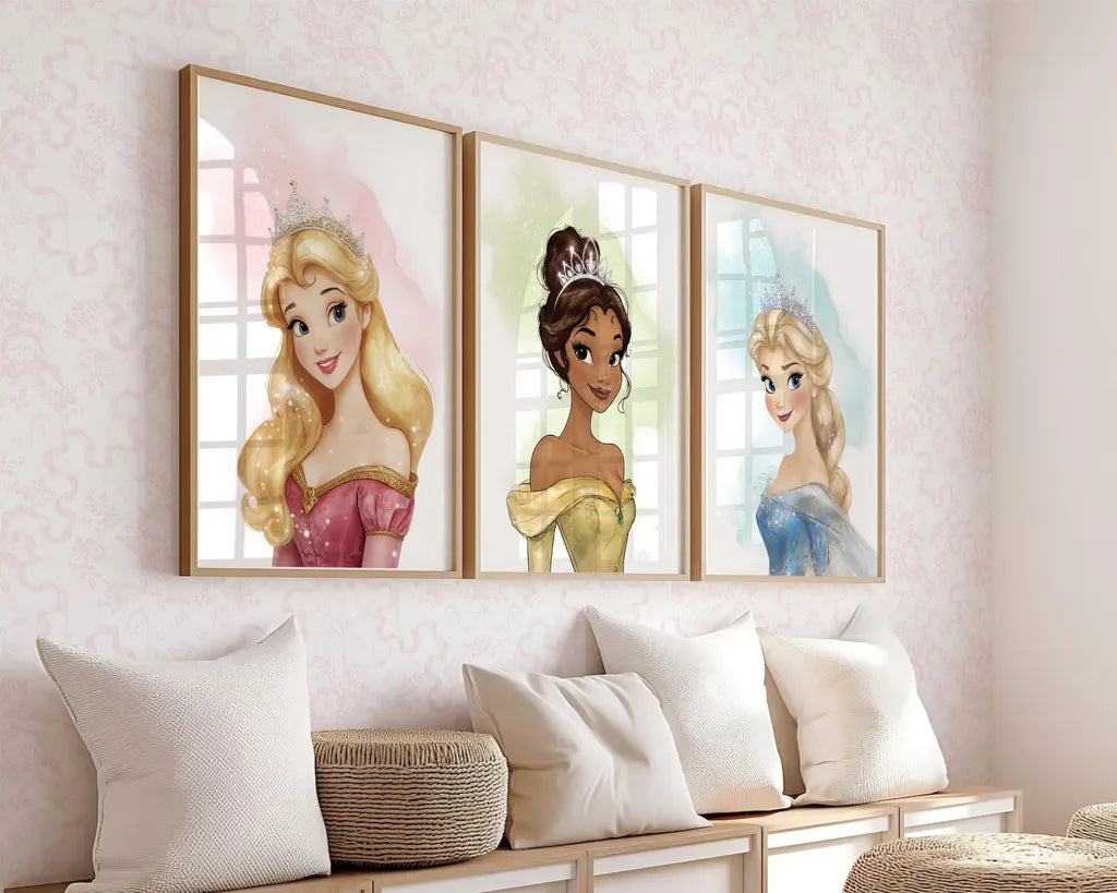 Three framed prints featuring Princess Aurora, Tiana, and Elsa styled in a cozy girls bedroom setting
