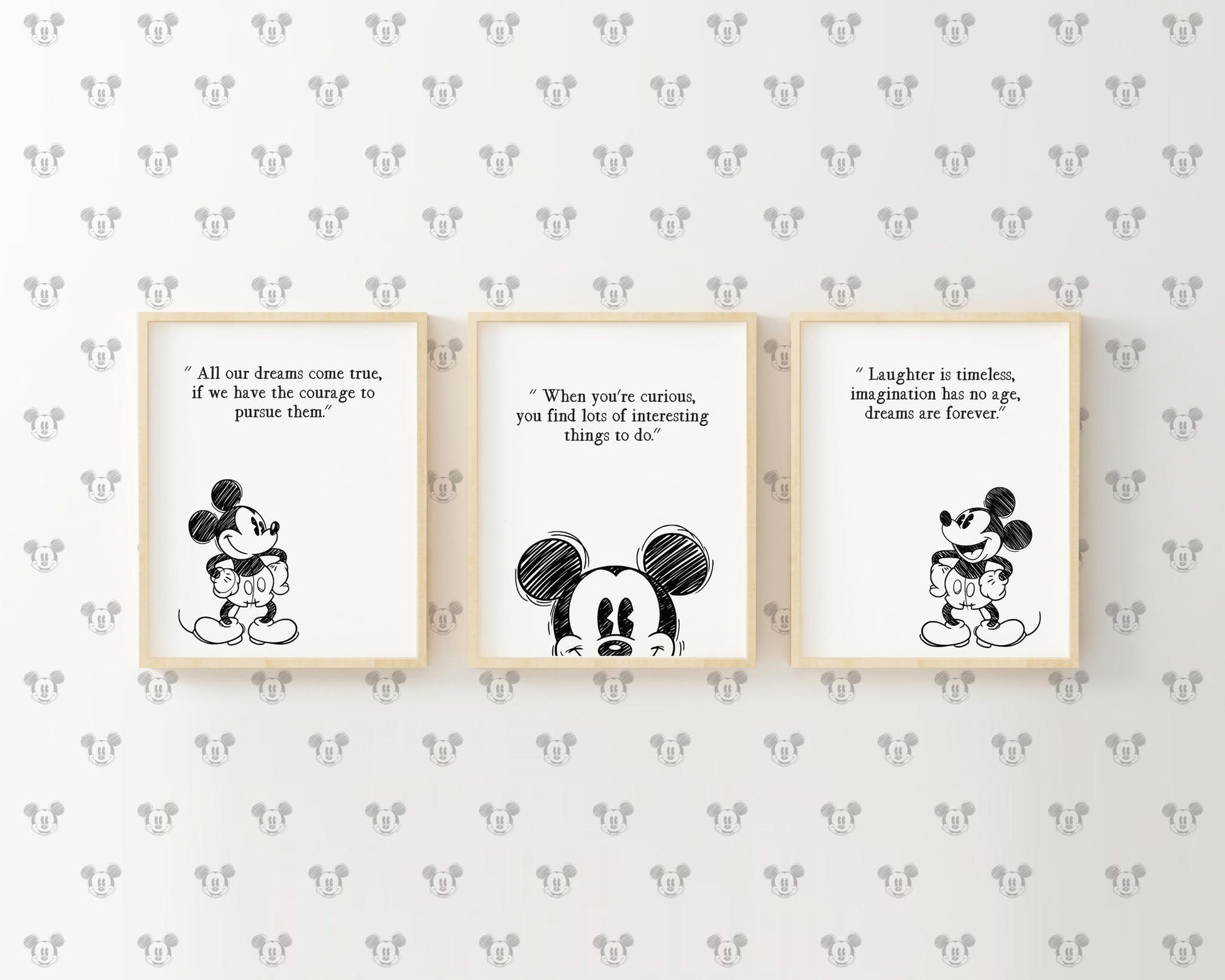 Frontal view of the three Mickey Mouse black and white sketch art prints arranged side by side as a nursery gallery wall