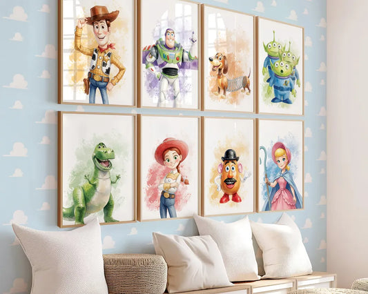 Set of framed Toy Story watercolor art prints featuring Woody, Buzz Lightyear, Jessie, and friends above a nursery couch
