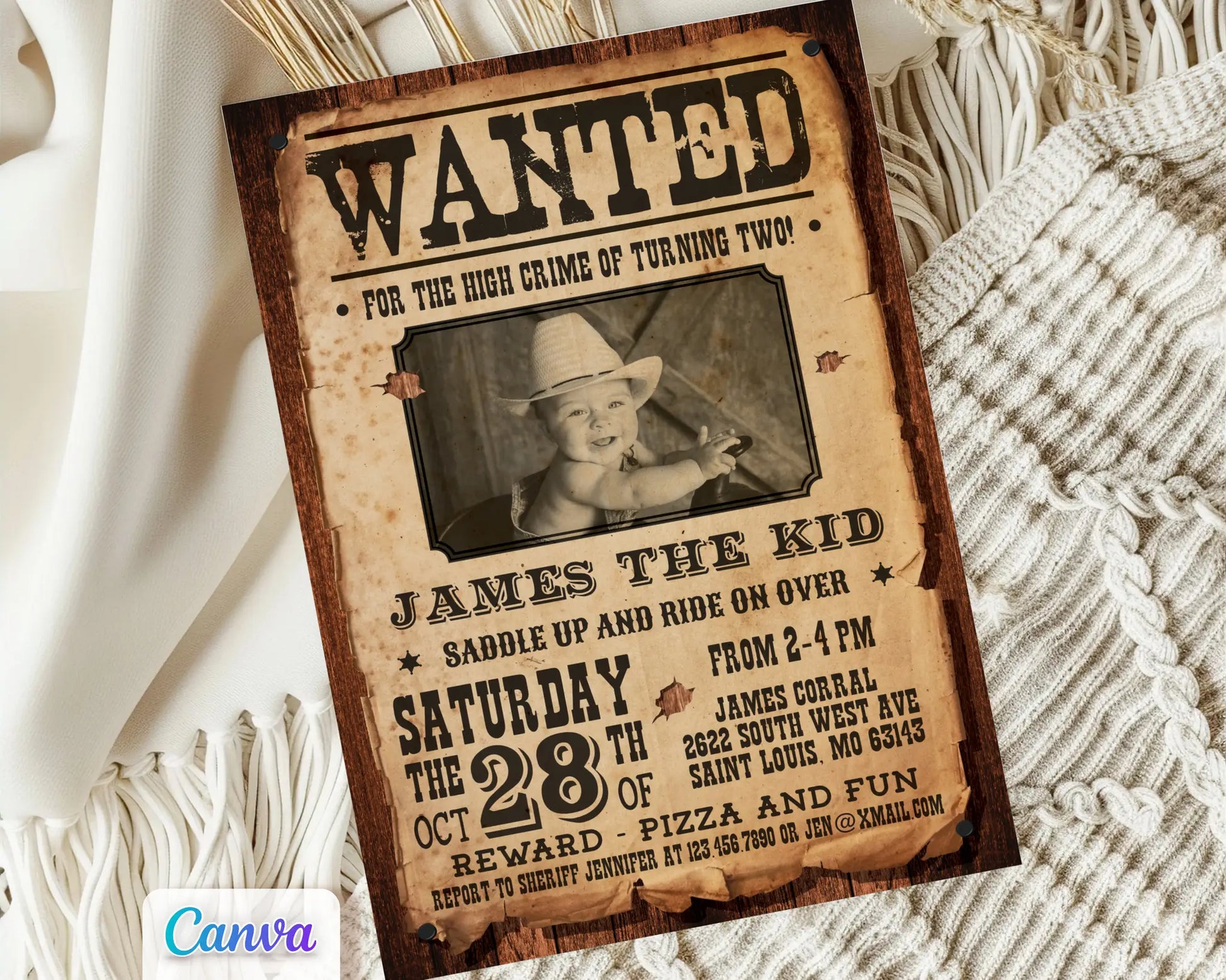 Custom cowboy birthday invitation in vintage Wanted Poster style, editable photo and text in Canva, rustic Wild West theme displayed on neutral fabric background.