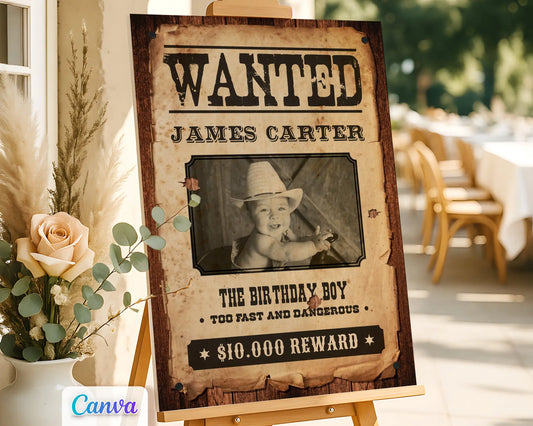 Custom Wanted Poster cowboy birthday sign with photo, editable Canva template for Wild West themed parties, displayed on rustic easel with floral decor.