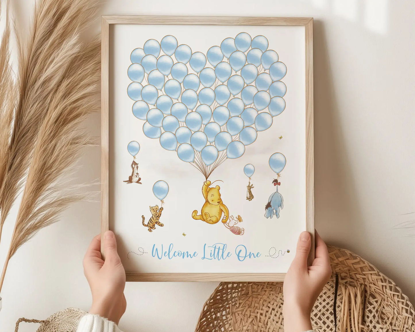 Blue Winnie the Pooh baby shower guest book design with heart-shaped balloons and forest friends, ideal for baby boy celebrations.
