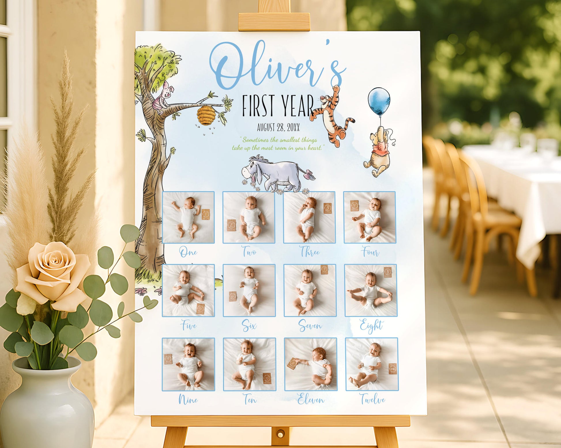 Winnie the Pooh first year photo board featuring a monthly baby photo timeline in a boy theme